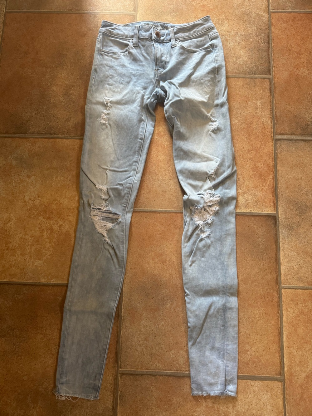 AE Light Wash Distressed Skinny Jeans